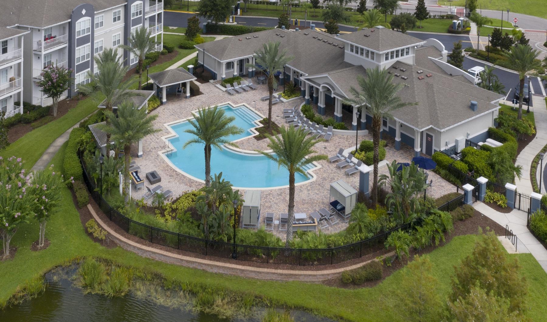 a pool surrounded by buildings