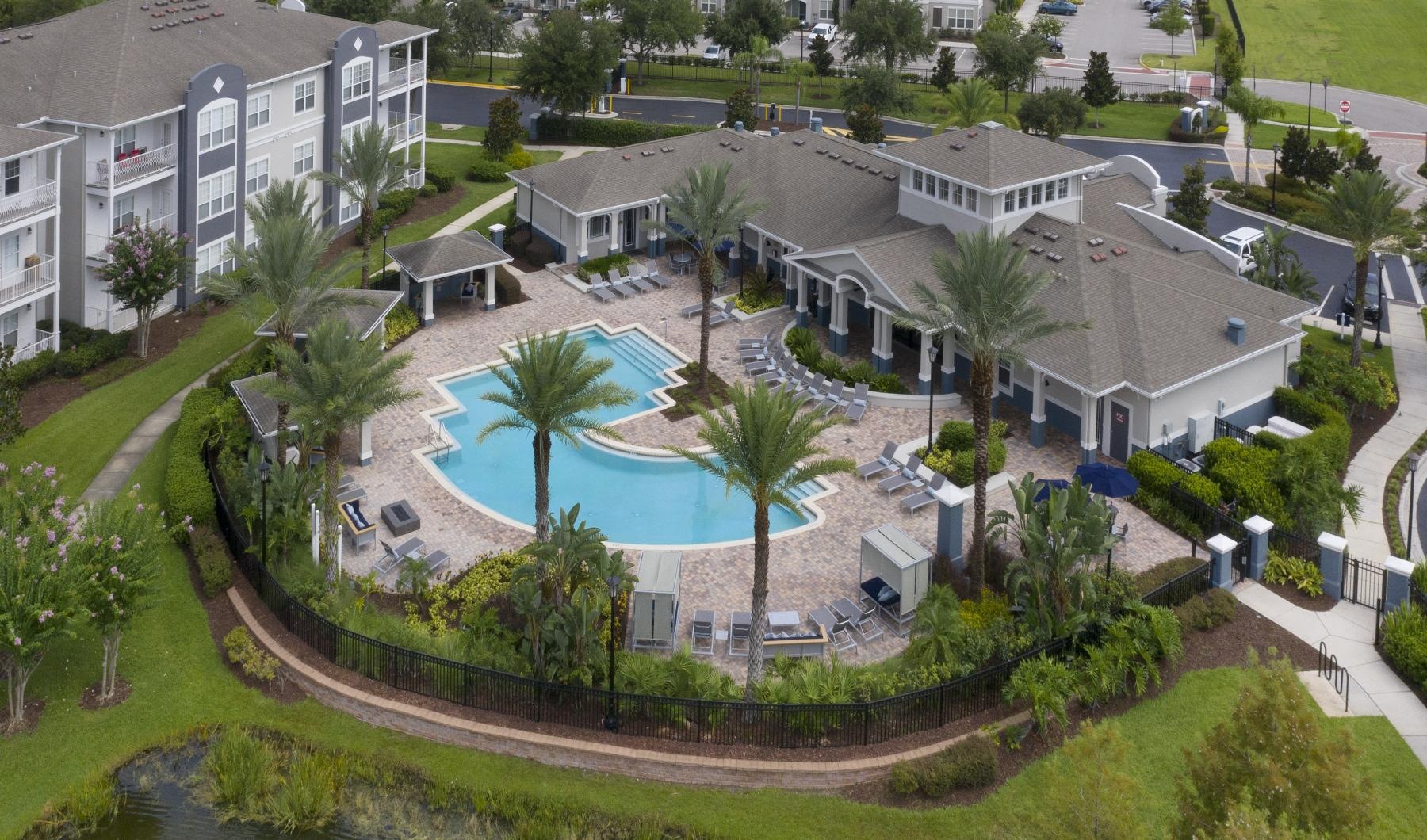 a pool surrounded by buildings