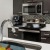 a kitchen with black cabinets