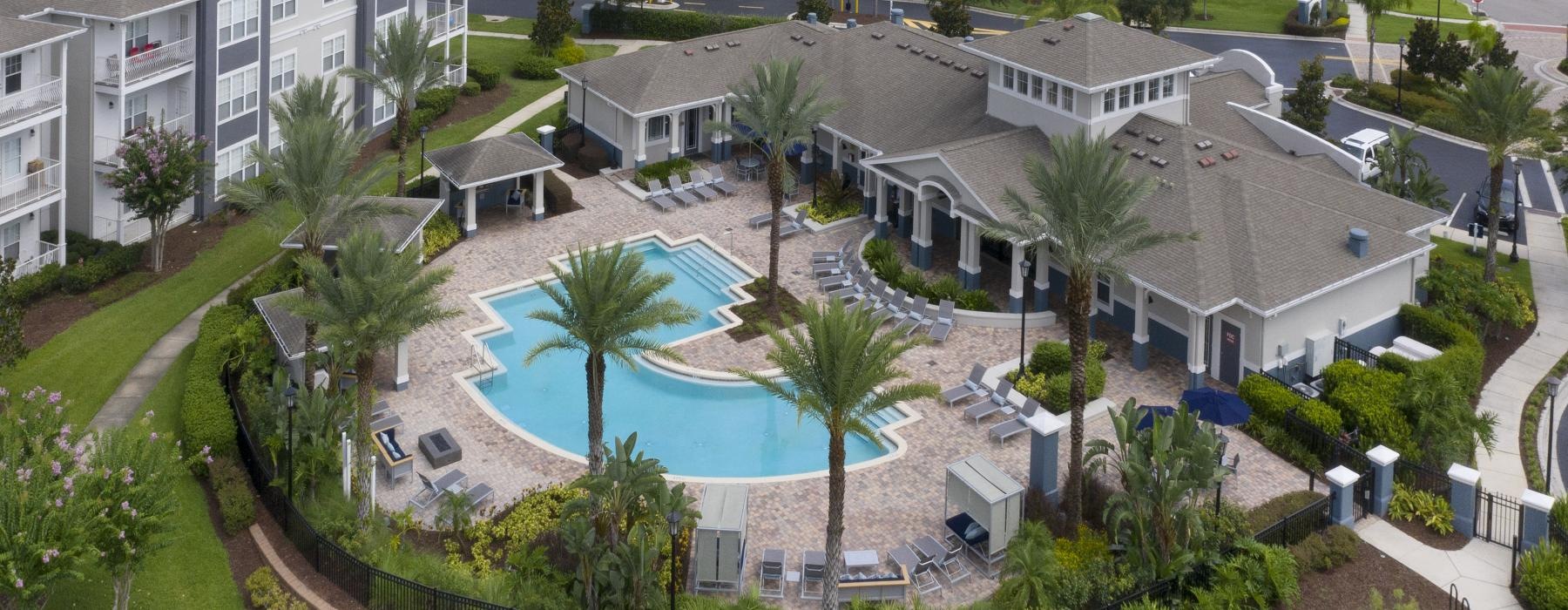 a pool surrounded by buildings