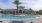 a swimming pool in front of a building